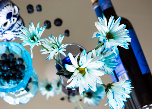 Photo of blue items being reflected in a mirror